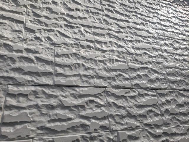 熊本市西区島崎サイディング外壁中塗り乾燥後表面アップ写真