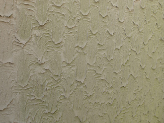 りんどう模様のモルタル外壁