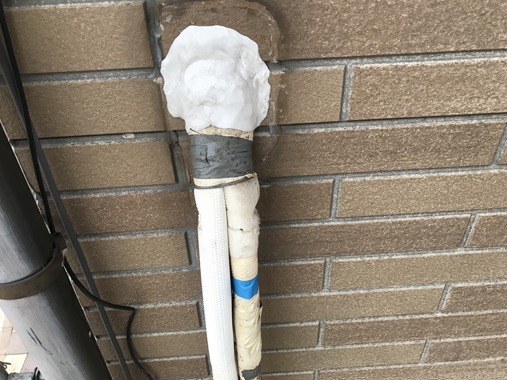 エアコン配管口の不具合補修