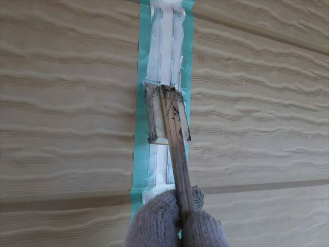 ヘラでならす