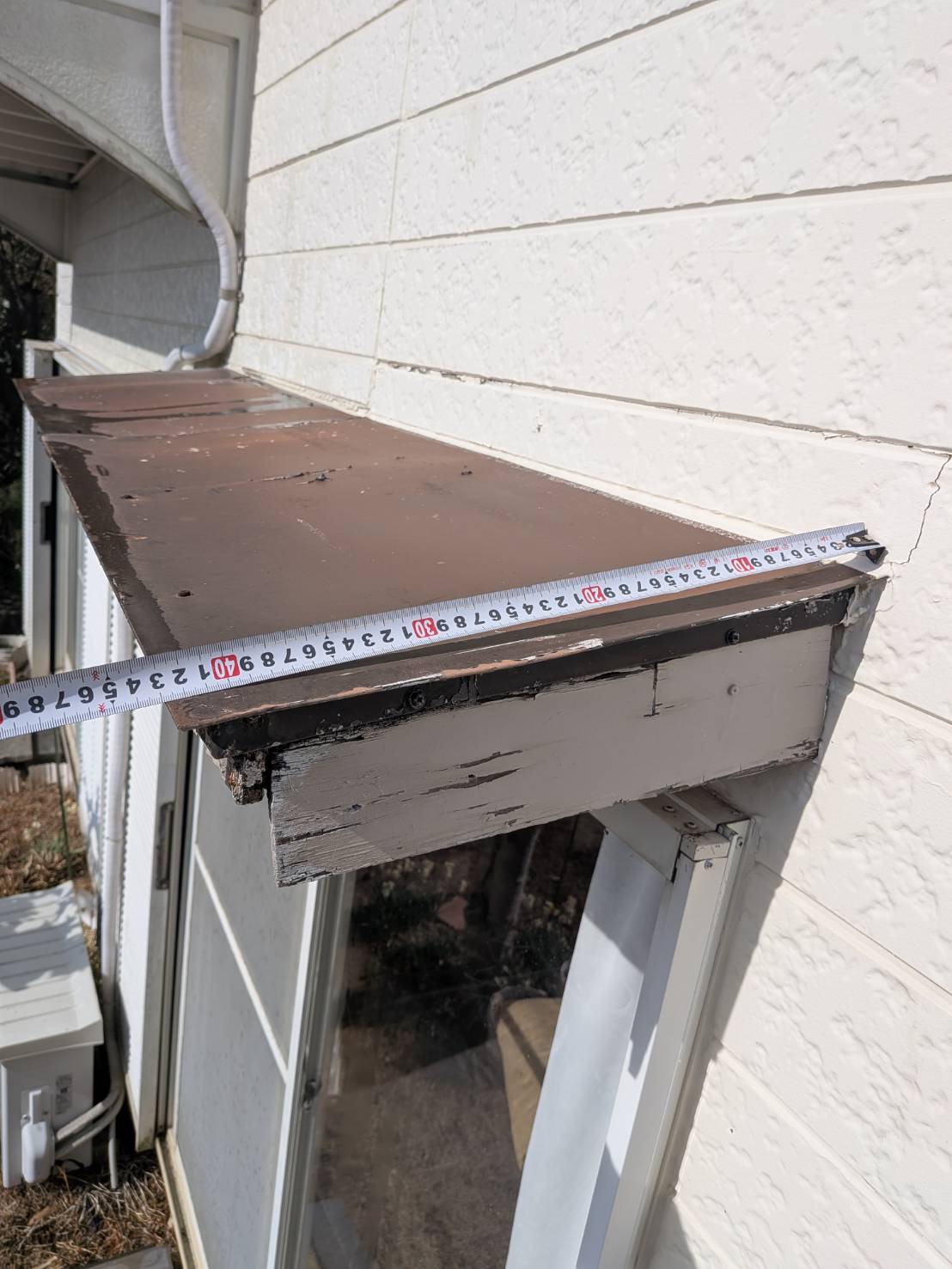 庇板金の寸法確認と納まりの見直し